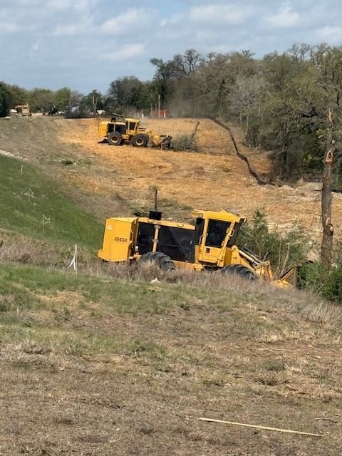 Mulching crew on a hillside, central Texas
